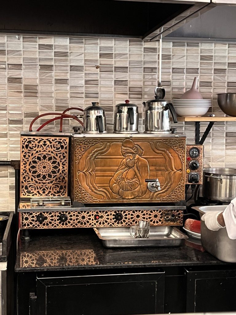 Tea stove with image carved onto it